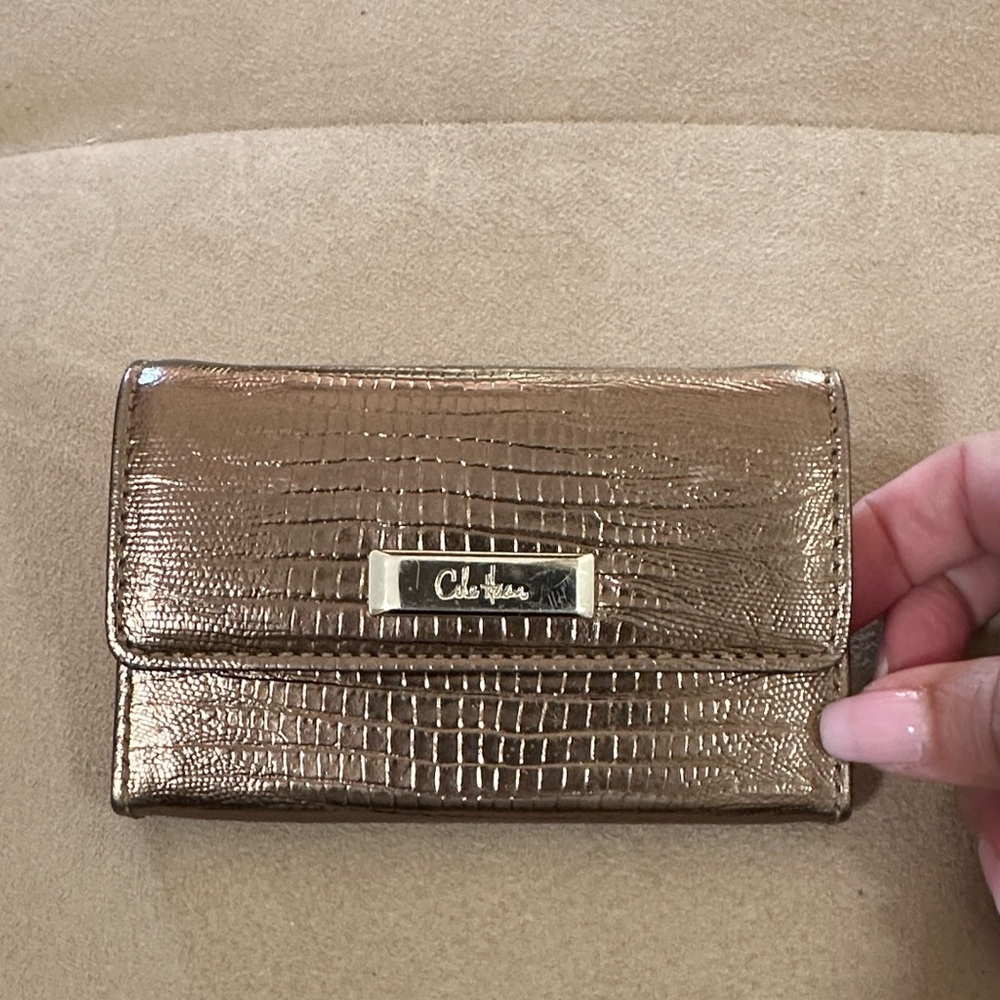 Cole Haan gold textured mini wallet card holder